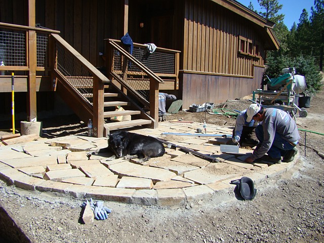 Final stage of dry set patio while clients dog naps in the sun.