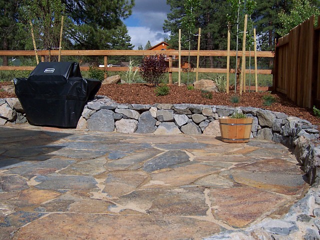 flagstone patio with rock wall flagstone patio with rock wall